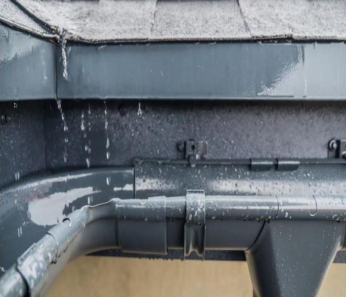 Water raining into home gutter system